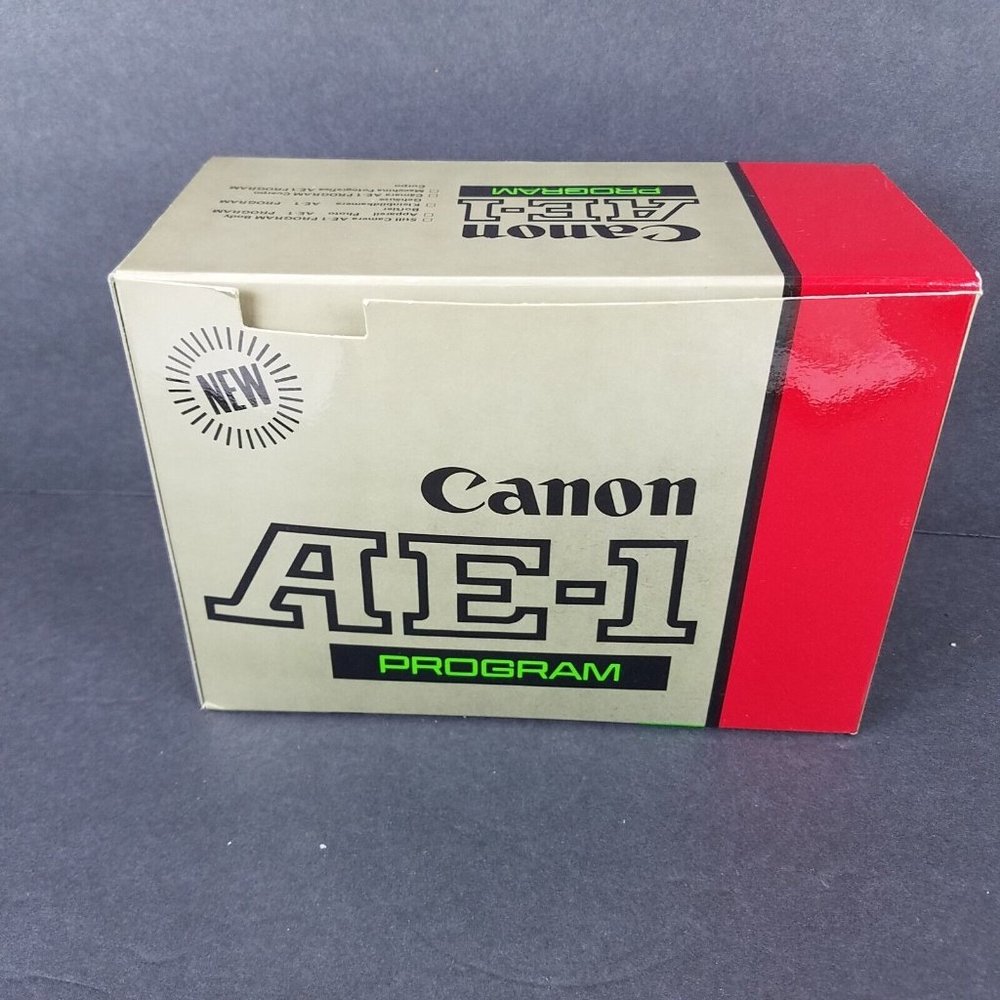 Vintage Canon AE-1 35mm SLR Film Camera with 50 mm lens Box Manual UNTESTED